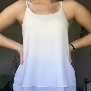 White flowing tank
